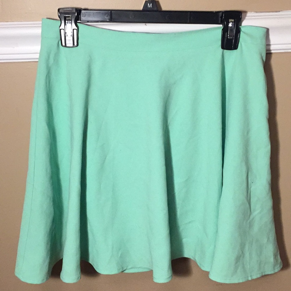 Cyan (blue/green colored) skirt